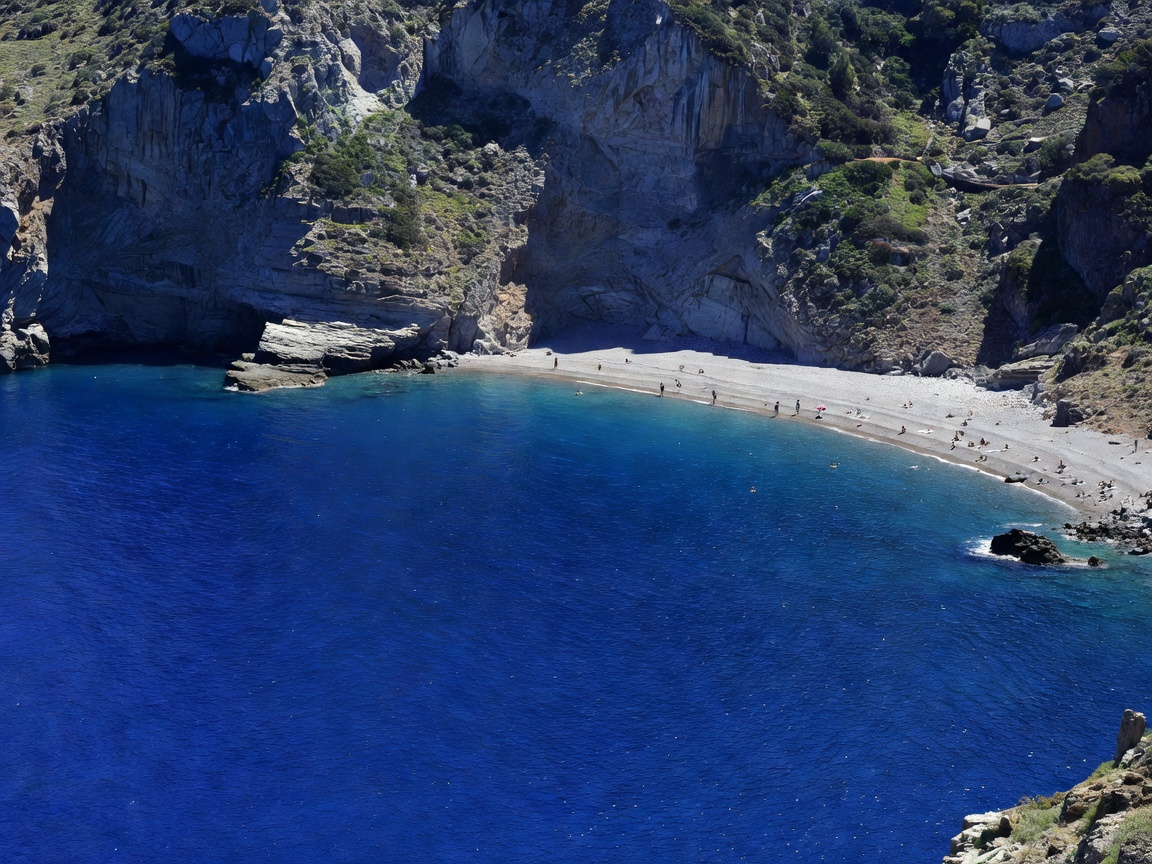 White monastery of Panagia Hozoviotissa carved into the giant vertical cliff in Amorgos